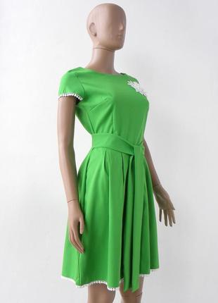 Нарядное платье зеленого цвета с аппликацией 42 размер (36 евроразмер).2 фото