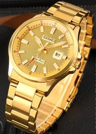 Мужские наручные часы skmei 1654 (золотистые на стальном браслете)3 фото
