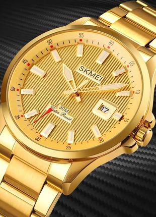 Чоловічий наручний годинник skmei 1654 (золотистий на сталевому браслеті)4 фото