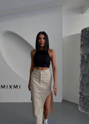 Джинсовая юбка миди с вырезом2 фото