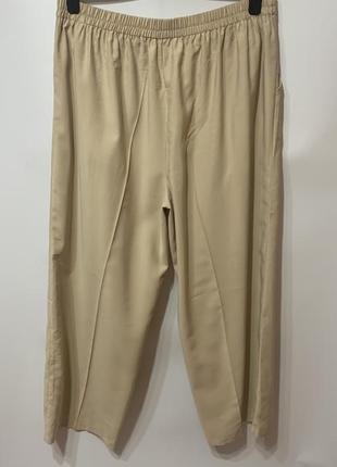 Бежевые брюки с широкими штанинами4 фото
