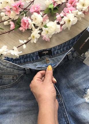 Стильный джинсовые рваные шорты со шнуровкой4 фото