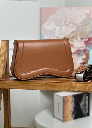 Женская сумка популярная коричневого цвета с длинным ремешком1 фото