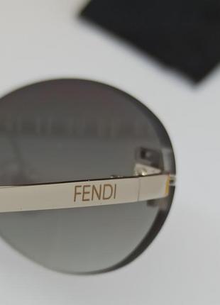 Окуляри в стилі fendi жіночі сонцезахисні овальні безоправні вузькі сіро зелений градієнт з сріблястим металом8 фото