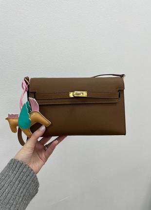 Женская сумка hermes kelly pochette brown/gold4 фото