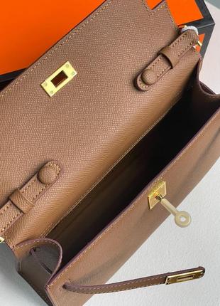 Женская сумка hermes kelly pochette brown/gold8 фото