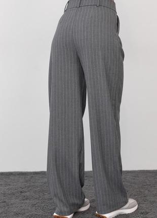 Жіночі брюки в смужку8 фото