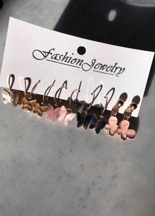 Набір сережок сережки метелики підвіски висячі рожеві чорні під камінь золотисті жіночі дитячі1 фото