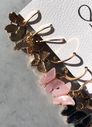 Набір сережок сережки метелики підвіски висячі рожеві чорні під камінь золотисті жіночі дитячі4 фото