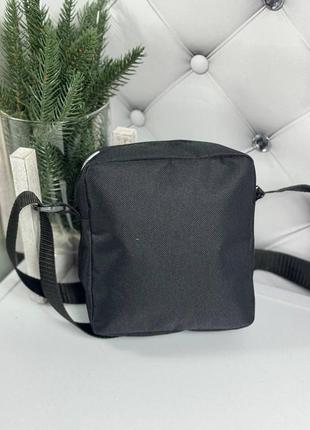 Небольшая мужская сумка кросс-боди через плечо черная4 фото
