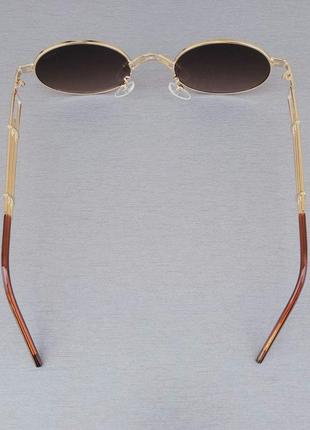 Очки женские солнцезащитные  овальные брендовые в стиле cartier коричневые в золоте6 фото