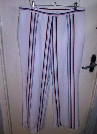 Шикарні,білі штани в різнокольорову смужку,висока посадка,великого розміру,німеччина