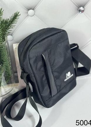 Небольшая мужская сумка барсетка через плечо черная2 фото