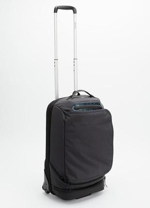 Спортивный чемодан сумка рюкзак на колесах kipsta urban 30л 53 x 34 x 21см черный1 фото