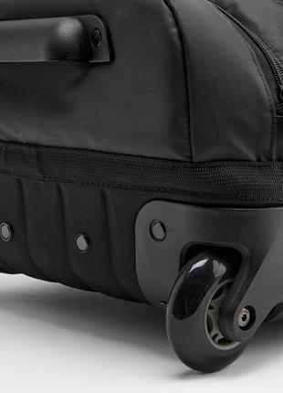 Спортивный чемодан сумка рюкзак на колесах kipsta urban 30л 53 x 34 x 21см черный9 фото