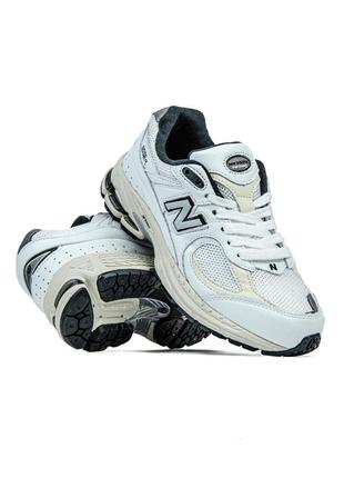 Кросівки жіночі / чоловічі сірі замшеві new balance 2002r8 фото