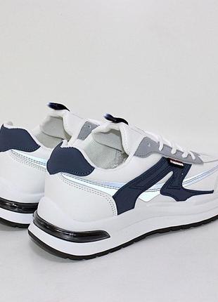 Молодіжні біло-сині брендові кросівки на шнурках3 фото