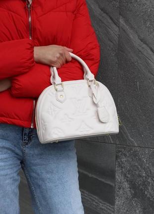 Louis vuitton alma ivory