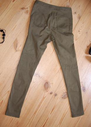 Стильные рваные джинсы цвета хаки с завышенной талией приятная цена.8 фото