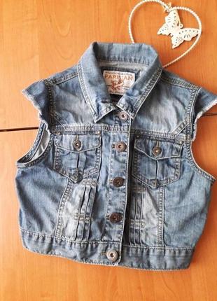 Стильна джинсова жилетка для дівчинки 10 років.