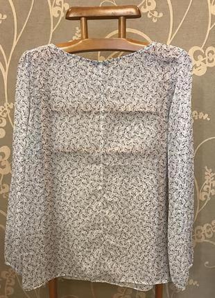Очень красивая и стильная брендовая блузка в бантиках.3 фото