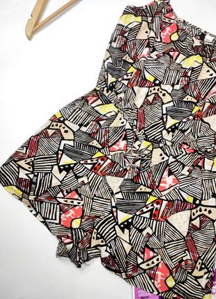 Комбинезон женский шортами в принт веж бренда divided 122 фото