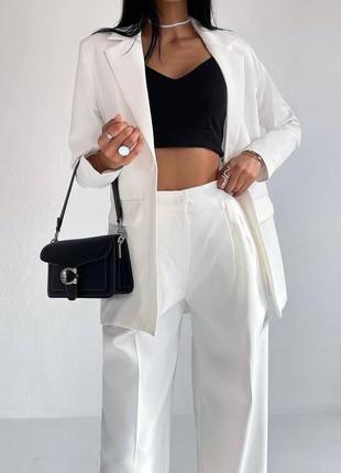 Костюм женский однонтонный классический оверсайз пиджак на пуговице брюки свободного кроя на высокой посадке с карманами качественный базовый белый2 фото
