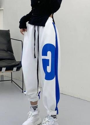 Спортивные штаны джоггеры свободного кроя на резинках стильные базовые оверсайз на высокой посадке черные серые белые3 фото