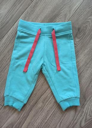 Яркие трикотажные штанишки impidimpi для девочки, 62-68 см.
