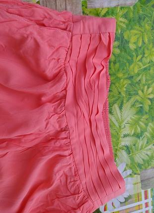 Кораловая юбка с разрезами и карманами2 фото