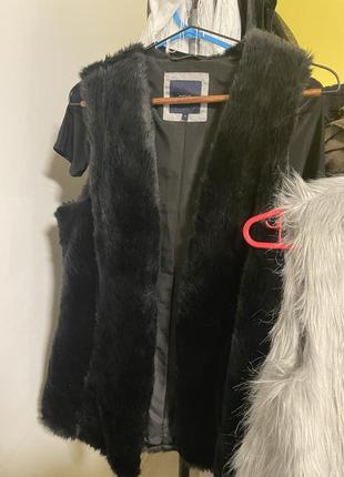 Женская жилетка