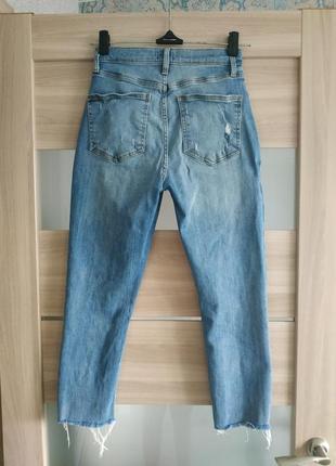 Стильные высокие необработанные джинсы2 фото