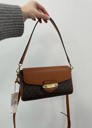 Стильная, нарядная женская сумка, прочная кожаная michael kors  бренда корс9 фото