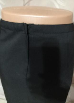 Мини юбка с пайетками спереди черного цвета,7 фото