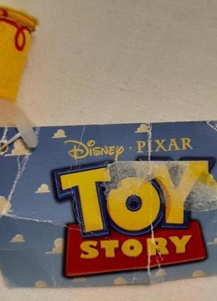Іграшка м'яка  toy story - disney pixar dino trading b.v.6 фото