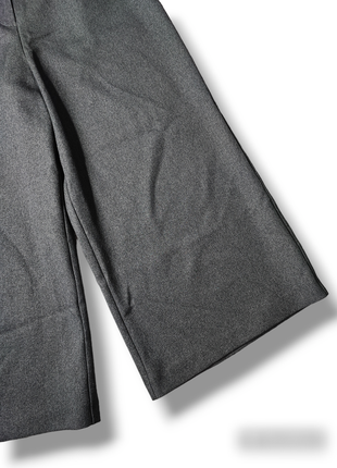 Стильные женские кюлоты с карманами укороченные брюки клеш3 фото