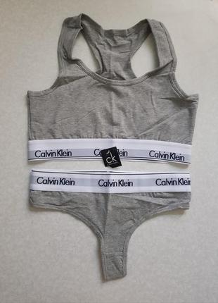 Набор calvin klein топ+стринги2 фото