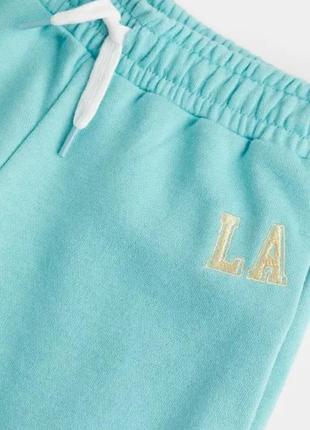 11-12/12-13/13-14/14+ р h&m нові фірмові базові спортивні штани палаццо спортивки з принтом la2 фото