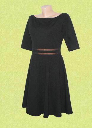 Трикотажное платье черного цвета с коротким рукавом