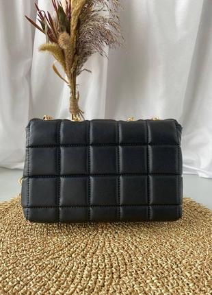 Жіноча брендова сумка michael kors  мʼяка модель корс в чорному кольорі по супер ціні корс на ланцюжку золото4 фото