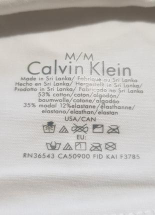 Набор calvin klein топ+стринги3 фото