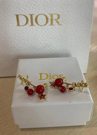 Брендові сережки