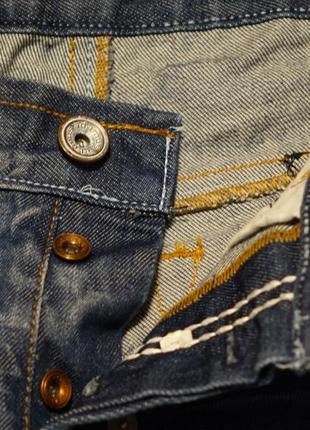 Масивні щільні х/б джинси з выбеленностями і потертостями adamus італія 32 р.2 фото