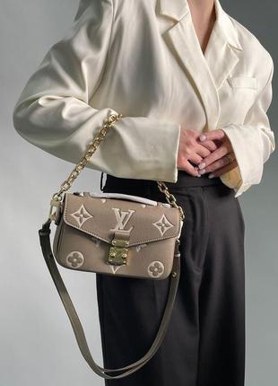 Женская сумка louis vuitton pochette métis east west bag beige2 фото