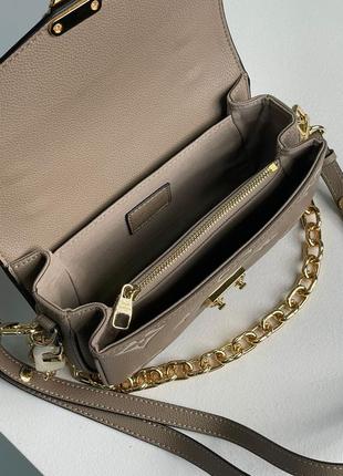 Женская сумка louis vuitton pochette métis east west bag beige7 фото