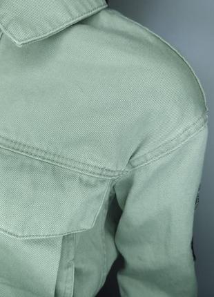 Коротенькая джинсовая куртка с мехом песца7 фото