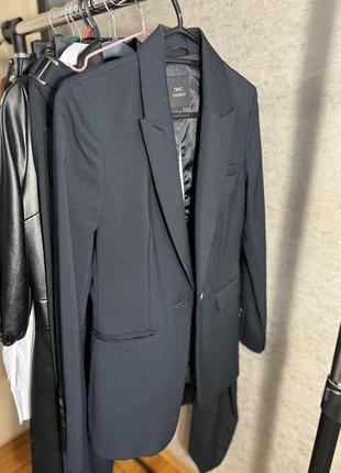 Брючний костюм з штанами кльош