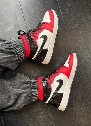 Жіночі кросівки nike air jordan 1 retro high black / red