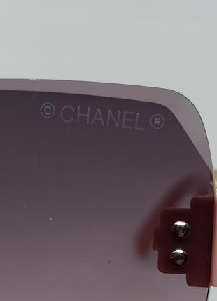Очки в стиле chanel женские солнцезащитные безоправные серо розовый градиент с золотым логотипом9 фото