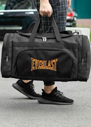 Мужская дорожная сумка everlast orange спортивная черная текстильная на 60л для путешествий